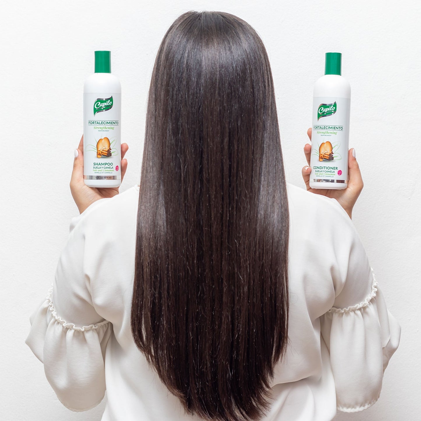 Capilo Sole and Cinnamon Shampoo – Nourishing hair thickener with cinnamon extract for scalp stimulation. Enhances shine, volume, and hair strength.